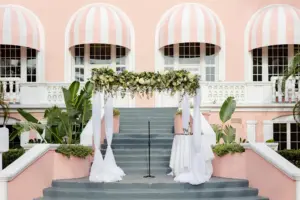 Classic White and Greenery Tall Wedding Chuppah Ideas with Draping | St Pete Beach Florist Lemon Drops
