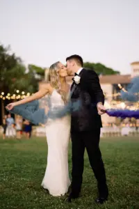Bride and Groom with Blue Colored Smoke Bomb at Wedding Reception | Photographer Dewitt For Love Photography