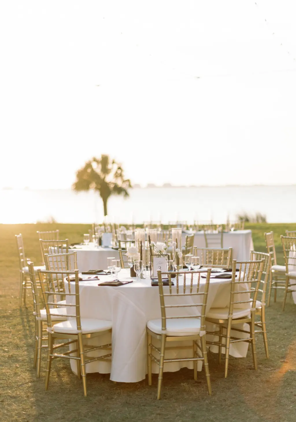 Timeless Black, White and Gold Outdoor Waterfront Wedding Reception