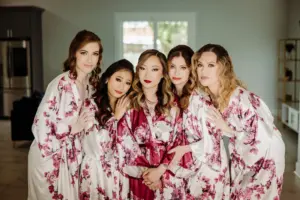 Bride and Bridesmaids Getting Ready | Red Floral Satin Wedding Day Robe Ideas