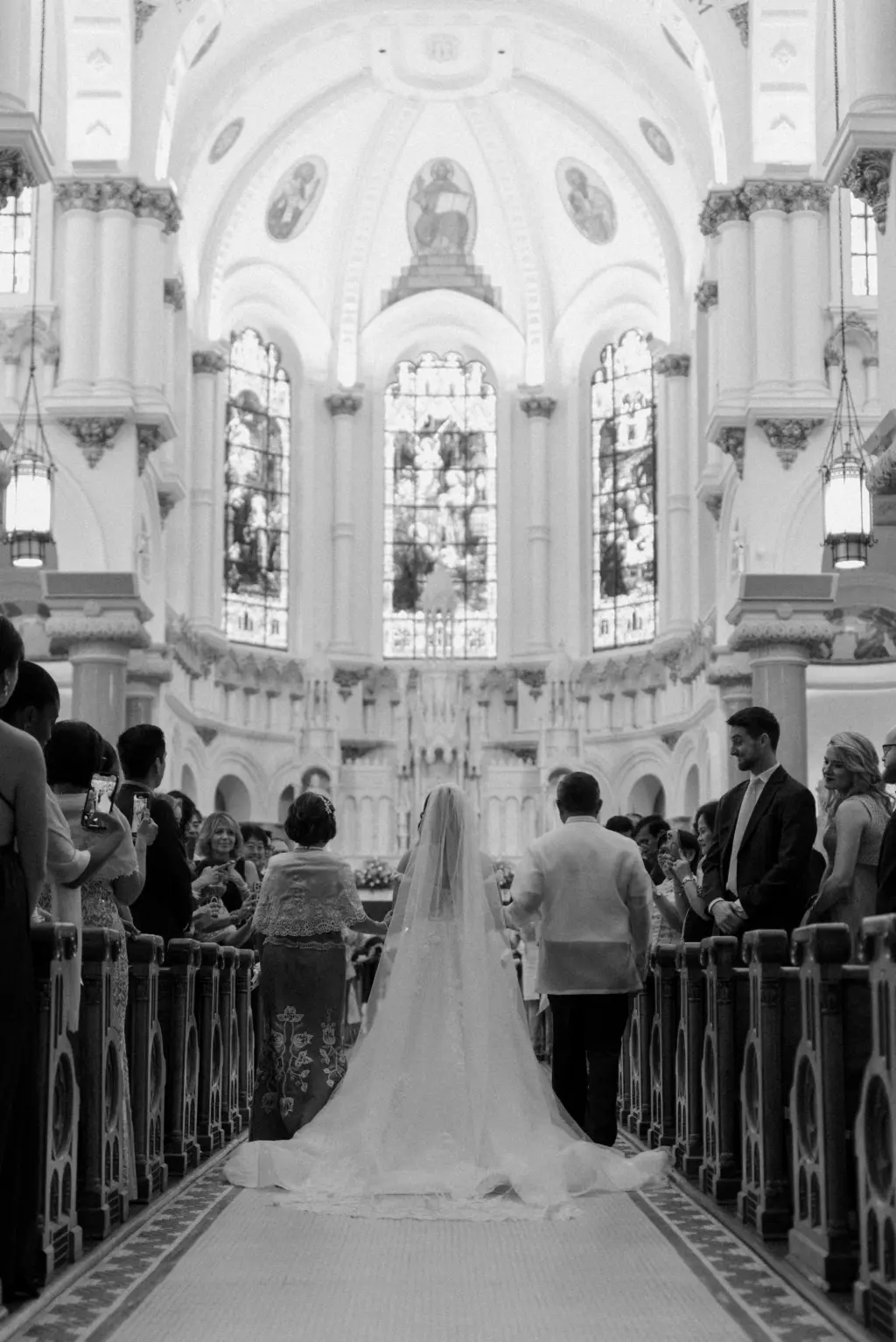 Father of the Groom Walks Bride Down the Aisle in Church Wedding Black and White Wedding Portrait | Tampa Church Ceremony Sacred Heart Catholic Church