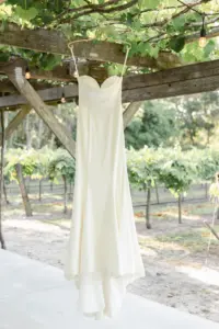 Ivory Strapless Chiffon Fit and Flare Wedding Dress Ideas | Tampa Bay Boutique Truly Forever Bridal