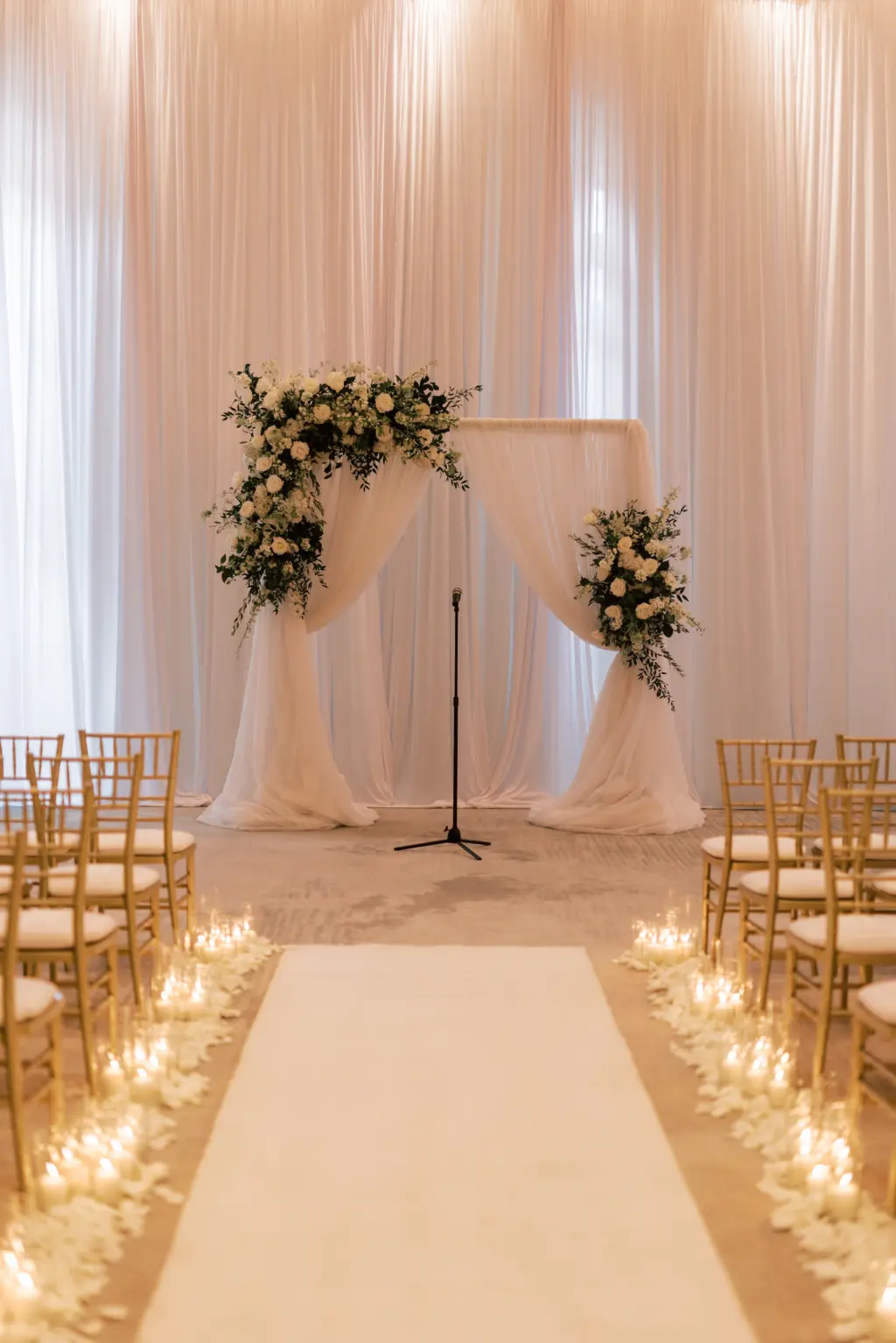 Romantic White Pipe and Drapery for Wedding Ceremony | White Flower Petals and Candles Lining Aisle Decor Ideas | Tampa Bay Rental Company Gabro Event Services