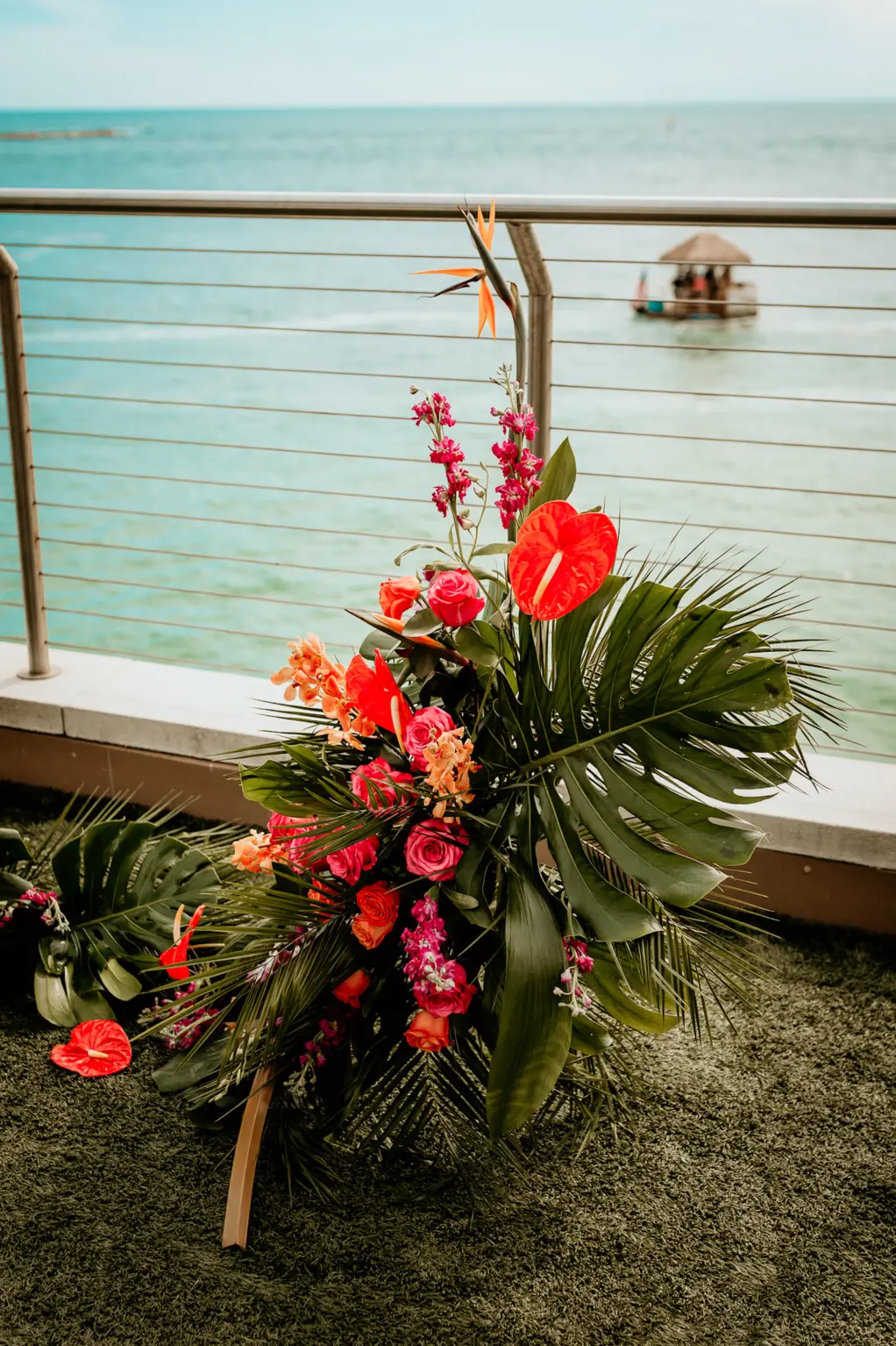 Tropical Monstera Leaves and Bright Tropical Florals | Wedding Ceremony Decor Inspiration | Clearwater Florist Save the Date Florida