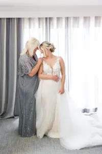 Bride and Mother Getting Ready | Elegant Hair and Makeup Ideas | White Lace Mermaid Giovanna Alessandro Wedding Dress with Plummeting Neckline Inspiration | White Bridal Giovanna Alessandro Overskirt | Tampa Bay HMUA Femme Akoi Beauty Studio