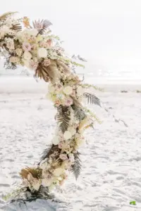 Boho Floral Circle Wedding Arch with Pampas Grass, Tropical Leaves, Dried Florals and Pink Garden Roses Wedding Decor Inspiration
