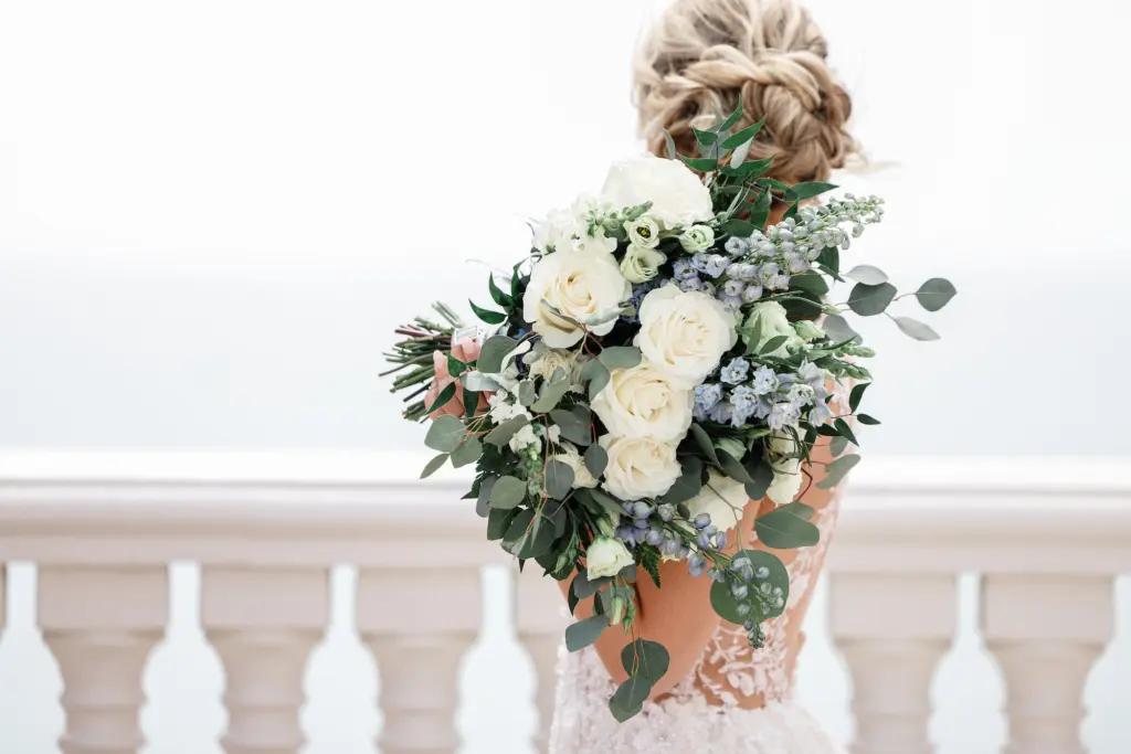 White Roses, Blue Delphinium, and Eucalyptus Bridal Wedding Bouquet Inspiration