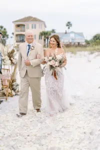 Father of the Bride Walks Bride Down the Aisle in Beach Wedding Ceremony Wedding Portrait