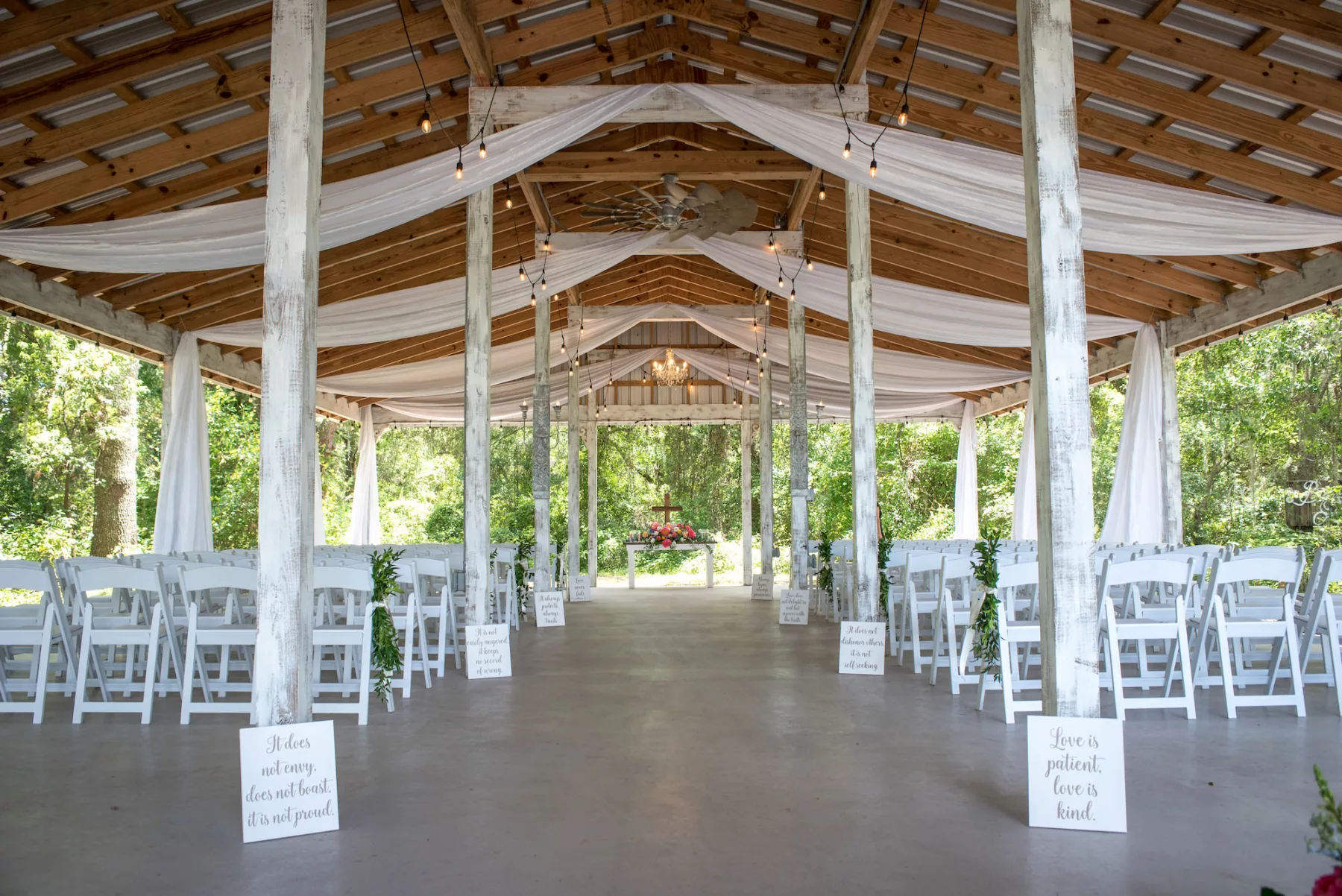Rustic Legacy Pavillion Wedding Ceremony Decor Inspiration | White Folding Garden Chairs and Drapery | Outdoor Brooksville Venue Legacy Lane Weddings