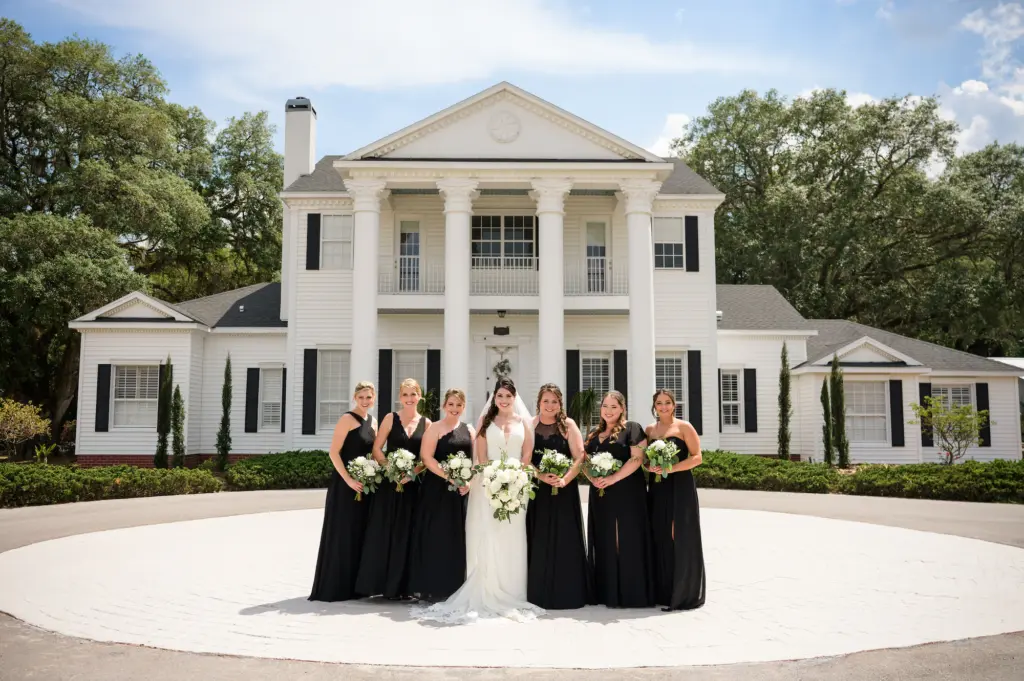 Mismatched Black Bridesmaids Wedding Dress Ideas | White Lace and Satin Fit and Flare Stella York Wedding Dress Inspiration | Tampa Bay Event Venue Legacy Lane Weddings