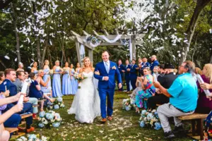 Bride and Groom Just Married Wedding Portrait | Confetti Cannon Ideas | Blue Bridgerton Garden Inspired Wedding Ceremony | Tampa Bay Event Venue Tabellas at Delaney Creek | Tampa Event Planner B Eventful