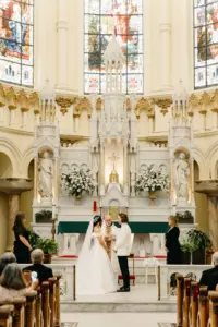 Bride and Groom Sacred Heart Catholic Church Wedding Ceremony Inspiration | Downtown Tampa Venue