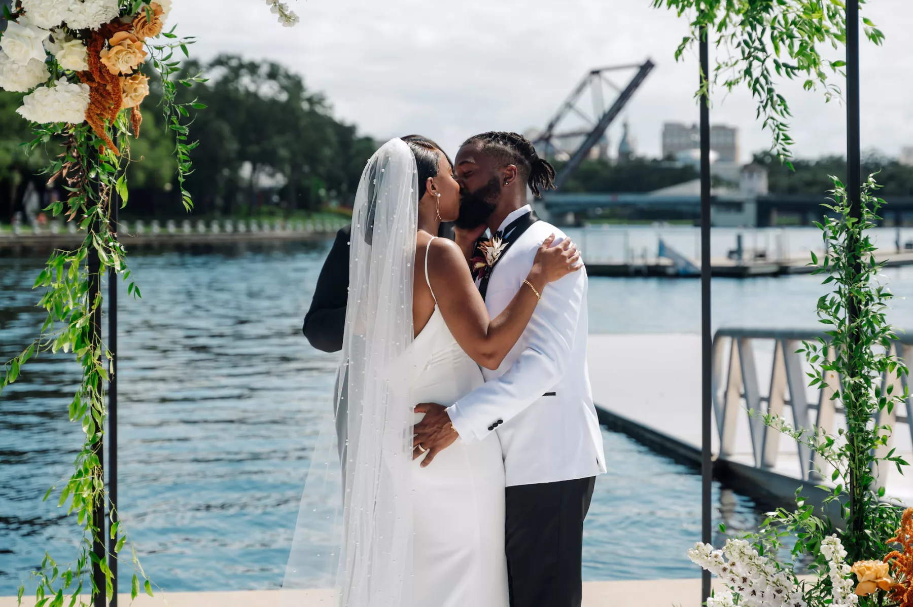 Bride and Groom First Kiss Wedding Portrait | Pearl Veil Ideas