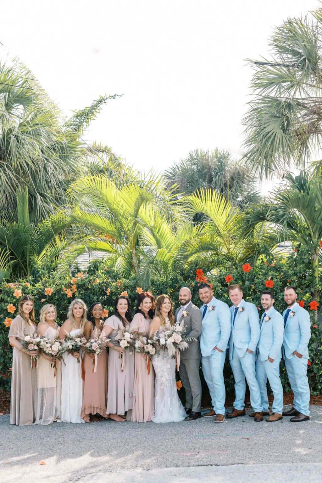 Bridesmaids in Floor Length Pale Blush Dusty Pink Bridesmaids Dresses and Groomsmen in Powder Blue Suits Bridal Party Portrait