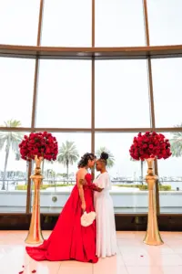 Brides First Kiss Portrait in Glam Gatsby Inspired Wedding Ceremony | Downtown St. Petersburg Florida Event Venue Mahaffey Theatre | Tampa Wedding Planner UNIQUE Weddings + Events | Tampa Wedding Dresses Truly Forever Bridal