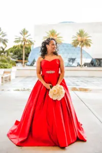 Bride in Red Strapless Ballgown Wedding Portrait Holding White Rose Bouquet | Tampa Wedding Planner UNIQUE Weddings + Events | Dresses Truly Forever Bridal