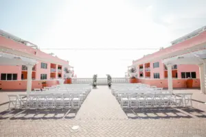 Elegant Outdoor Rooftop Wedding Ceremony with White Folding Garden Chairs Inspiration | Tampa Bay Event Venue Hyatt Regency Clearwater Beach