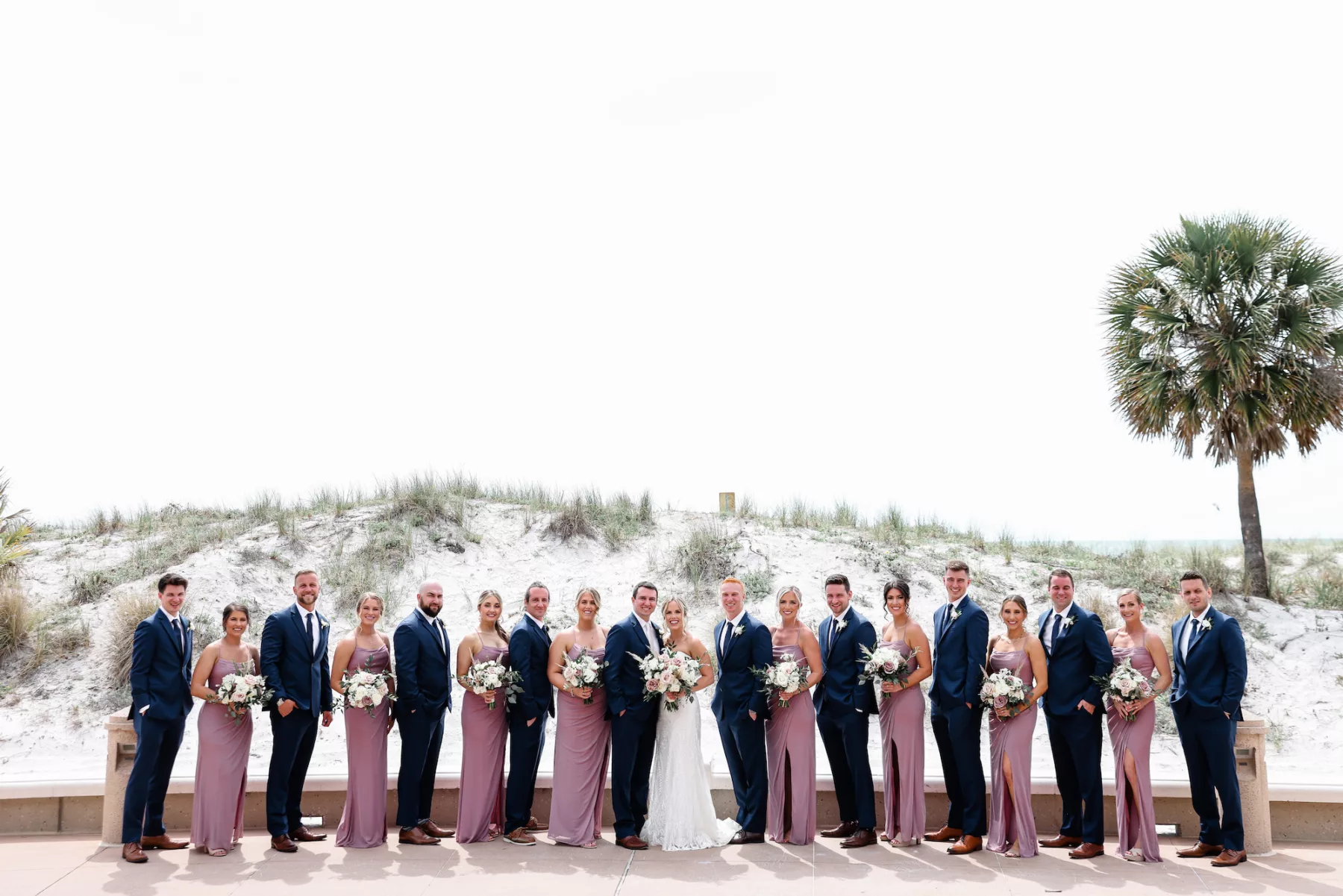 Mauve Matching Bridesmaids Dresses and Navy Groomsmen Suits Clearwater Beach Wedding Day Attire Ideas