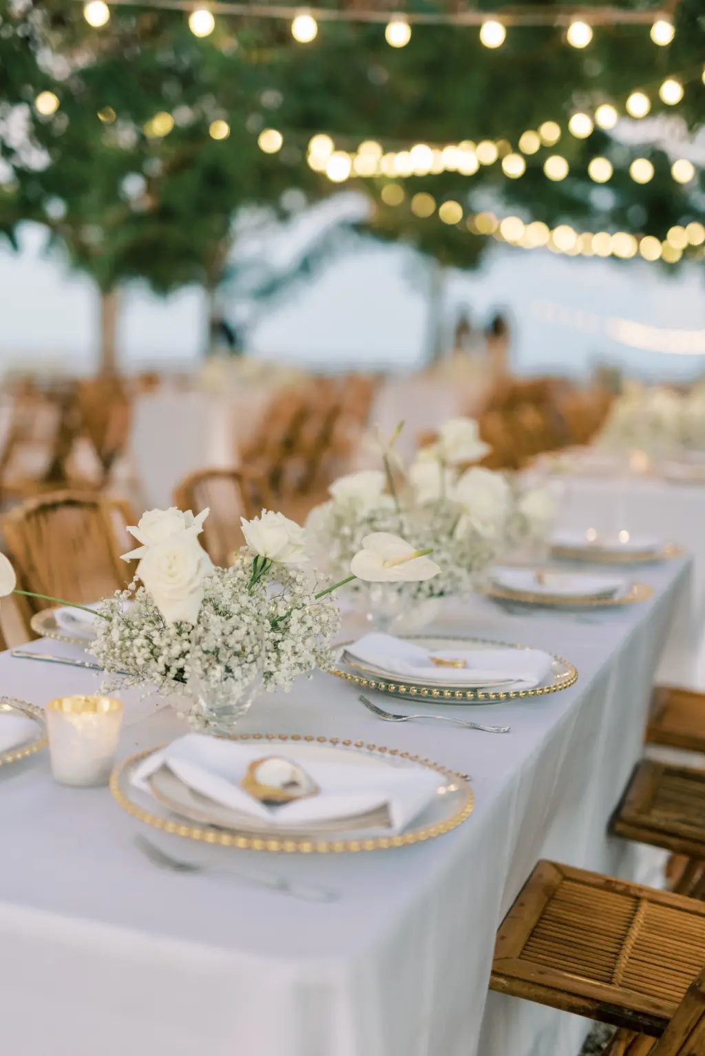 Elegant Coastal Light Blue and Cream Wedding Reception Decor Inspiration | Gold Beaded Chargers | White Roses and Baby's Breath Centerpiece Ideas
