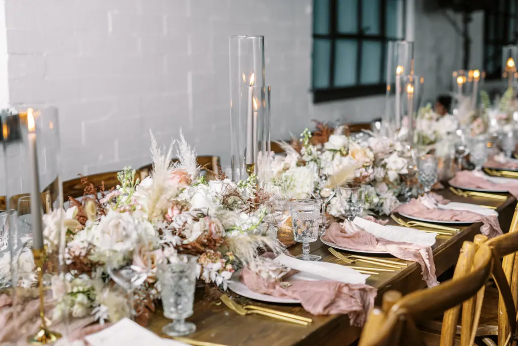 Blush and Cream Wedding Tablescape with Boho Dried Florals and Tapered Candles Wedding Decor | Tampa Wedding Caterer Olympia Catering