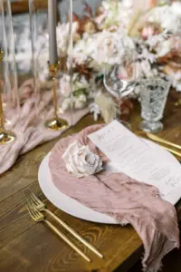 Blush and Cream Wedding Tablescape with Boho Dried Florals and Tapered Candles Wedding Decor Place Setting | Vellum Menu Card Plated Meal | Tampa Event Caterer Olympia Catering