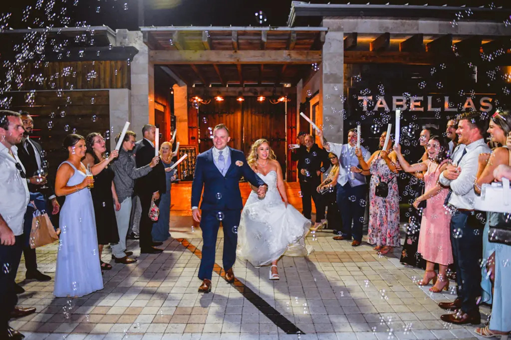 Bride and Groom Wedding Reception Grand Exit Inspiration | Bubble and Foam Wand Send Off | Tampa Bay Event Venue Tabellas at Delaney Creek | Planner B Eventful