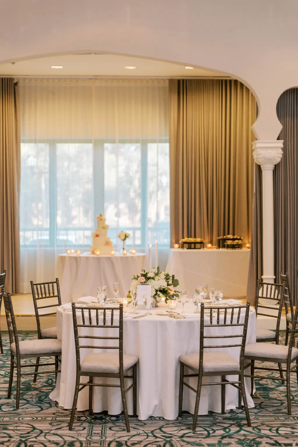 Round Tablescape White Linens with Black Chiavari Chairs and Elegant White Centerpieces with Greenery Inspiration