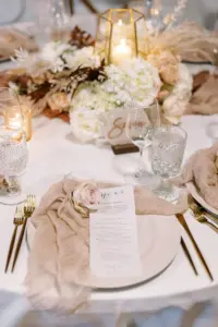 Blush Napkin Linen with Gold flatware and Blush Detailing Boho Wedding Place Setting Inspiration | Vellum Menu Card Plated Meal | Tampa Event Caterer Olympia Catering