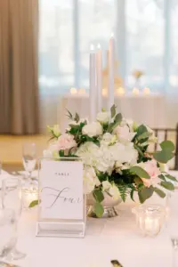 White and Blush Pink Floral Centerpiece Ideas with Greenery and Acrylic Table Numbers