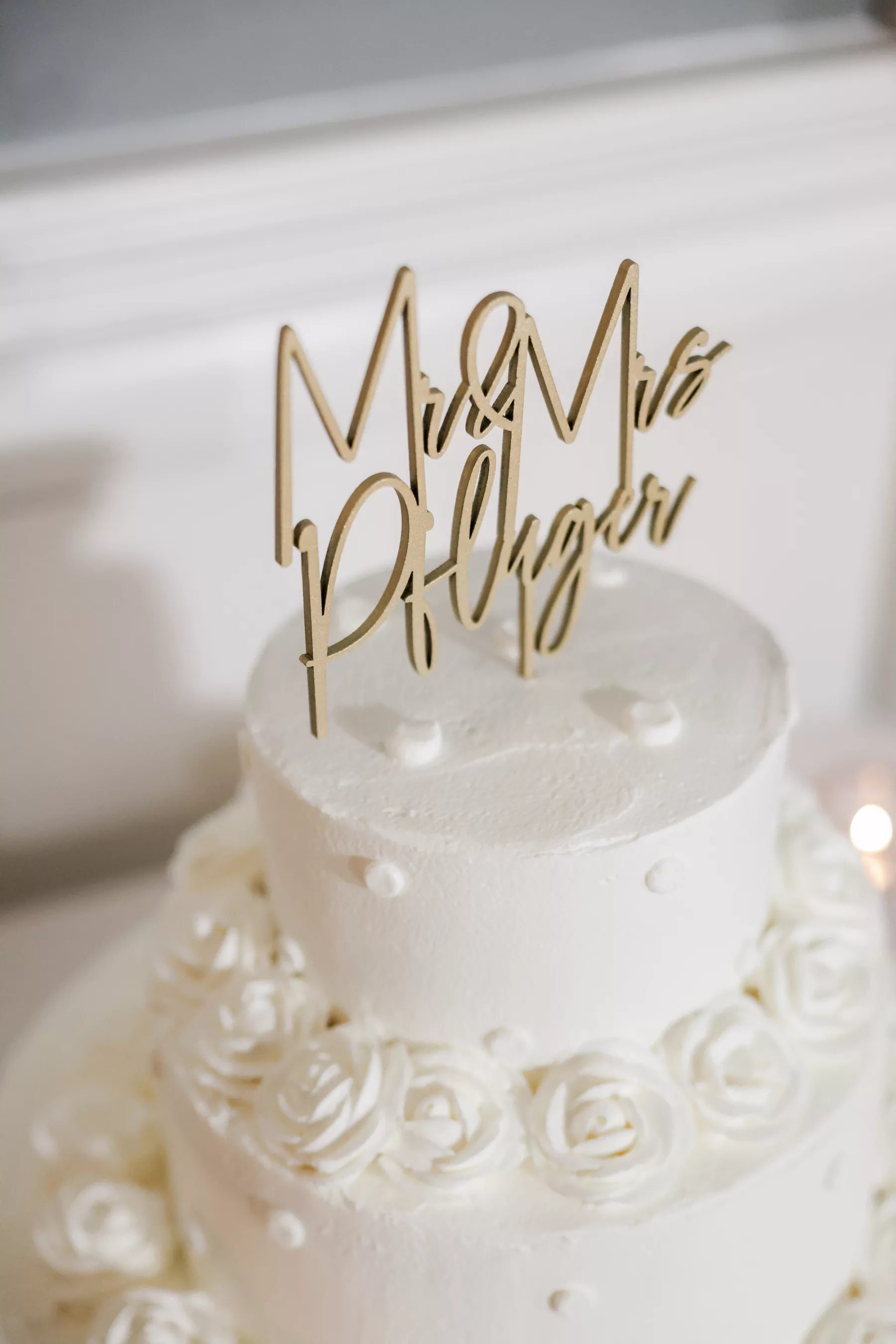 Custom Laser Cut Cake Topper Ideas | White Two-Tiered Round Buttercream Wedding Cake with Icing Flowers Inspiration