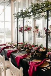 Whimsical Black and Pink Wedding Reception Decor Ideas | Hanging Floral Centerpiece Inspiration with Cascading Greenery | Tampa Kate Ryan Event Rentals | A Chair Affair