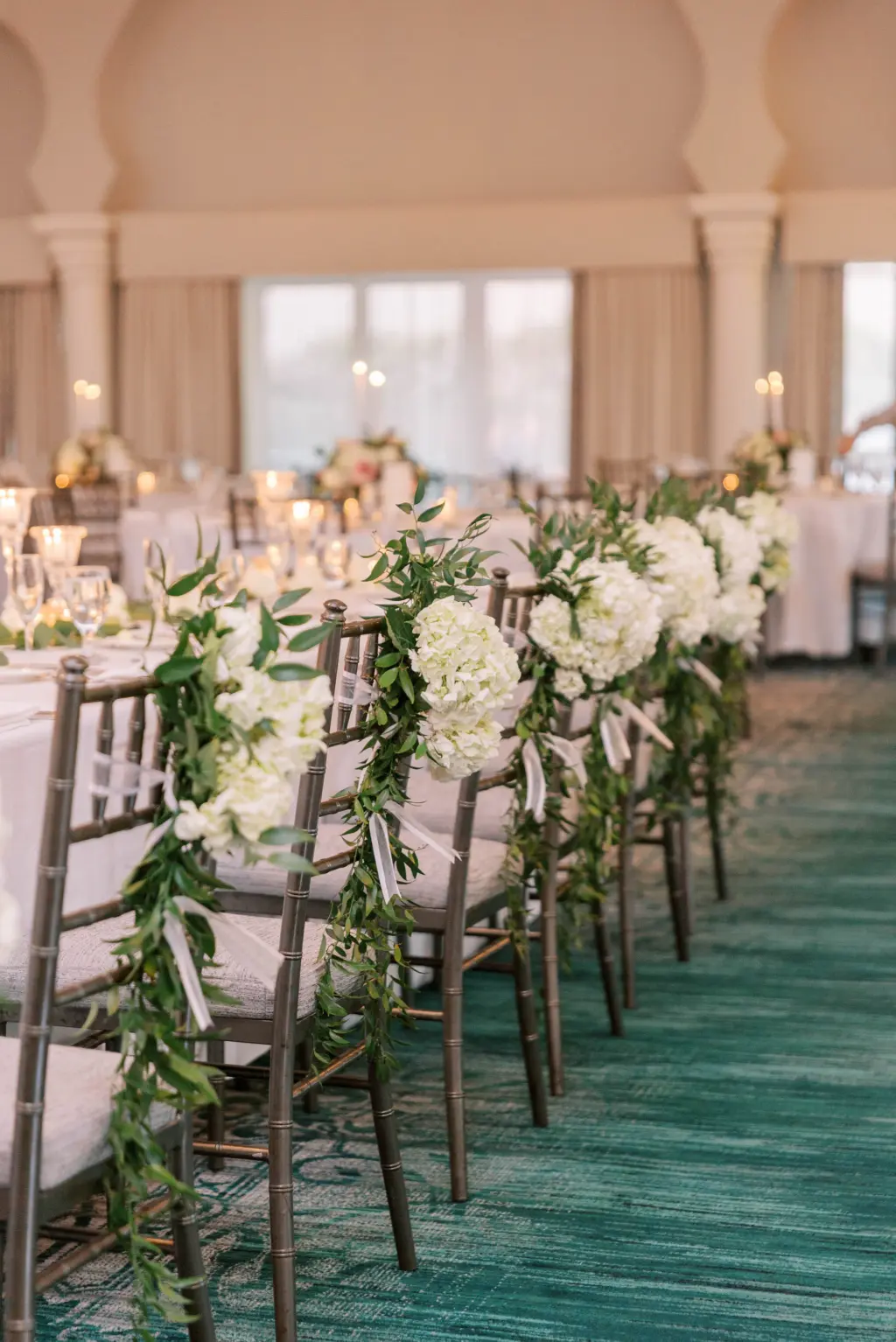 Black Chiavari Chairs with Cream and Greenery Flowers | Elegant Wedding Reception Decor Inspiration