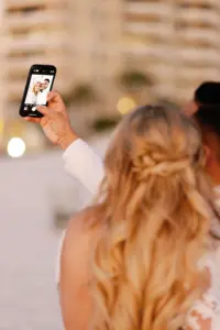 Bride and Groom Taking Wedding Selfie