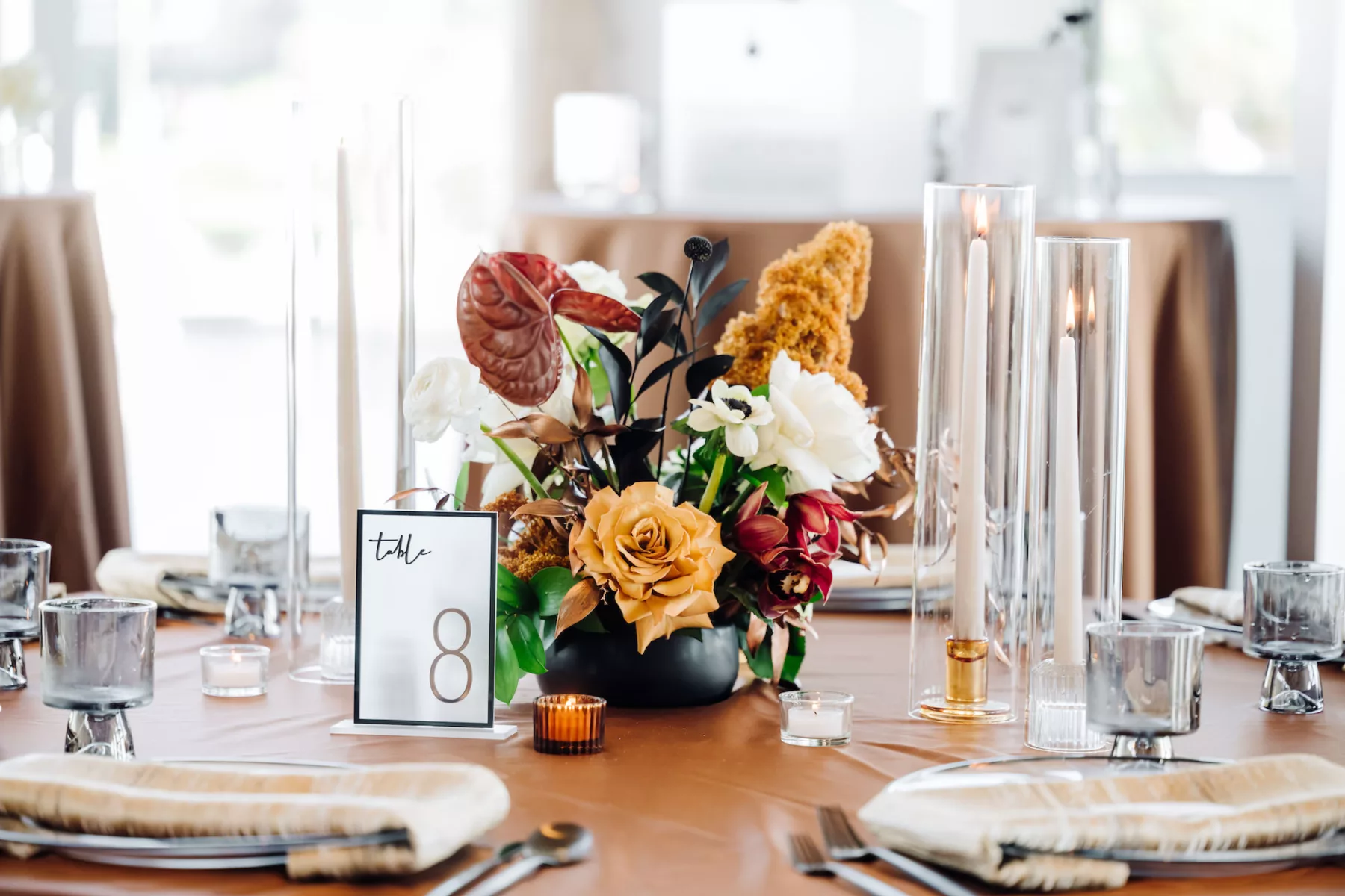 Modern Bronze Wedding Reception Centerpiece Inspiration | Brown Anthurium, Orange and White Roses, and Greenery Centerpiece Decor Ideas