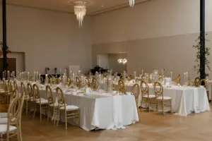 Modern Boho Long Feasting Tables with White Linens and Taper Candles | Spring Wedding Reception Centerpiece Ideas | Tampa Event Venue Hotel Haya | Planner Coastal Coordinating