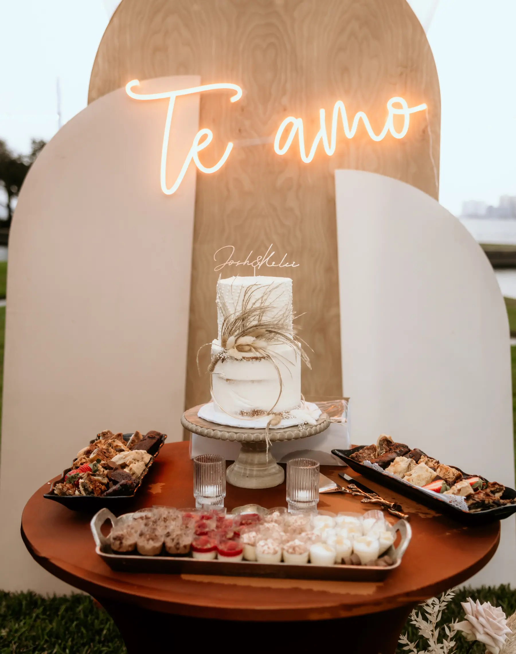 Boho Wedding Reception Cake Table Dessert Ideas | Te Amo Neon Sign, Arch Backdrop Decor Inspiration