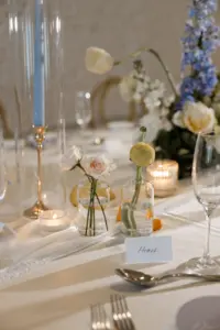 Roses In Bud Vase Wedding Reception Centerpiece Ideas with Blue Taper Candles