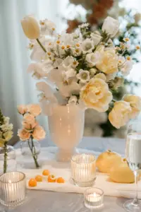 Spring Floral Centerpieces with Fruit and Tea Light Candles | White and Yellow Citrus Wedding Reception Inspiration