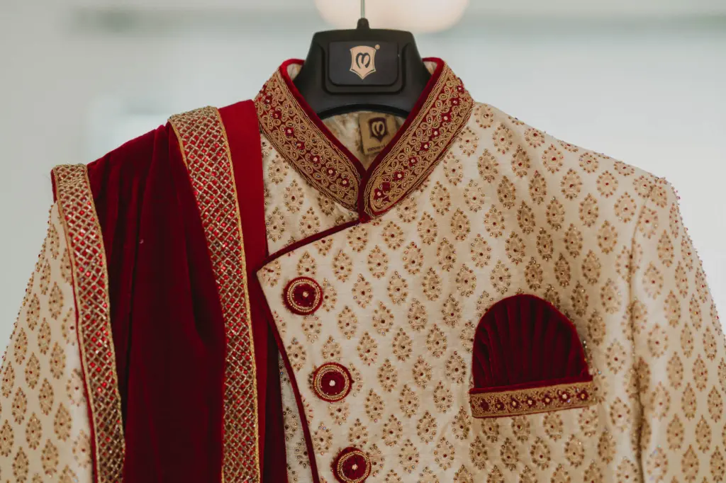 Groom's Red and Gold Sherwani with Stole Indian Wedding Day Attire Ideas
