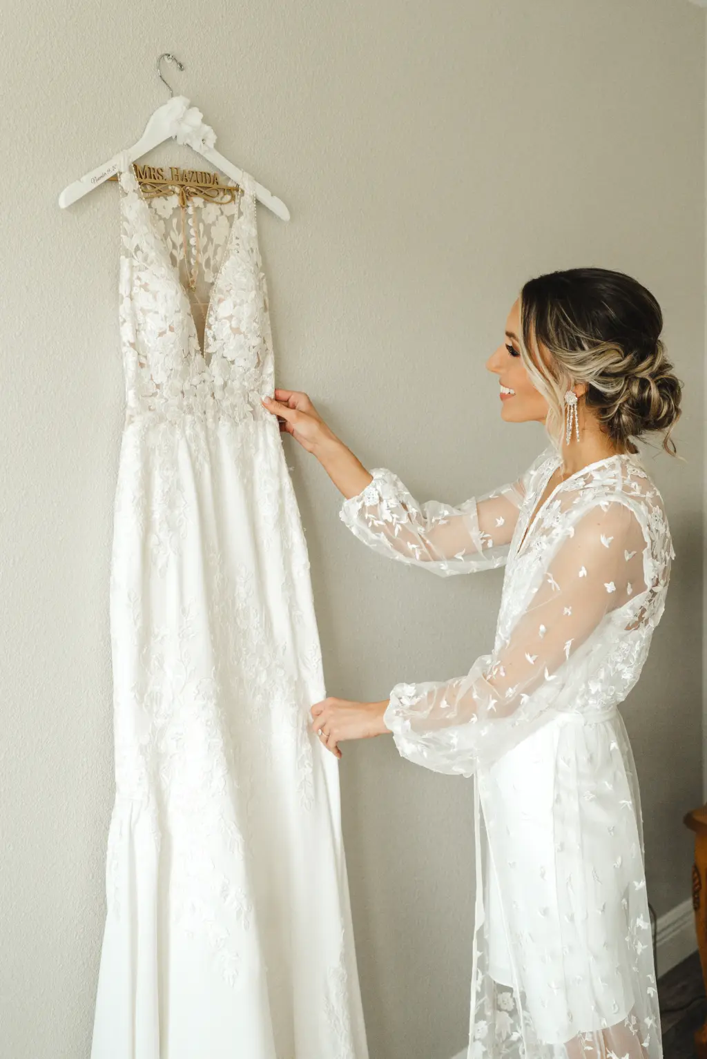 Bride Getting Ready Wedding Portrait | White Fit and Flare Pronovias Wedding Dress with Lace Bodice and Keyhole Back Inspiration