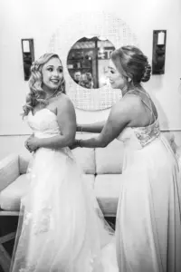 Bride and Bridesmaid Getting Ready Black and White Wedding Portrait