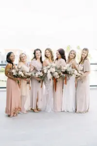 Pale Blush Dusty Pink Mix and Match Floor Length Bridesmaids Dresses Inspiration with Matching Boho Wedding Bouquets Bridesmaid Portrait
