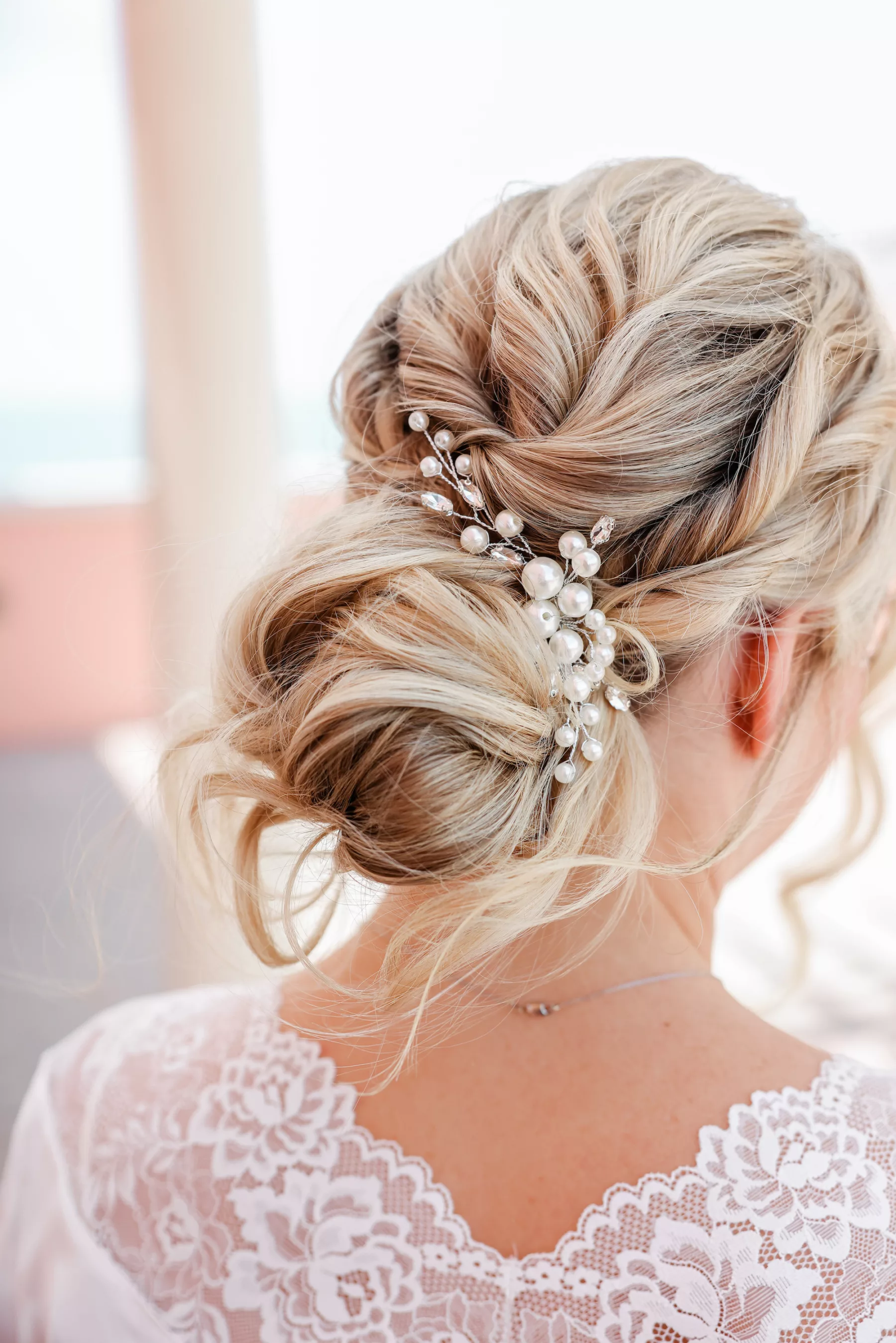 Romantic Wedding Hair Inspiration | Low Bun with Pearl Hair Pin | Tampa Bay Hair and Makeup Artist Femme Akoi Beauty Studio