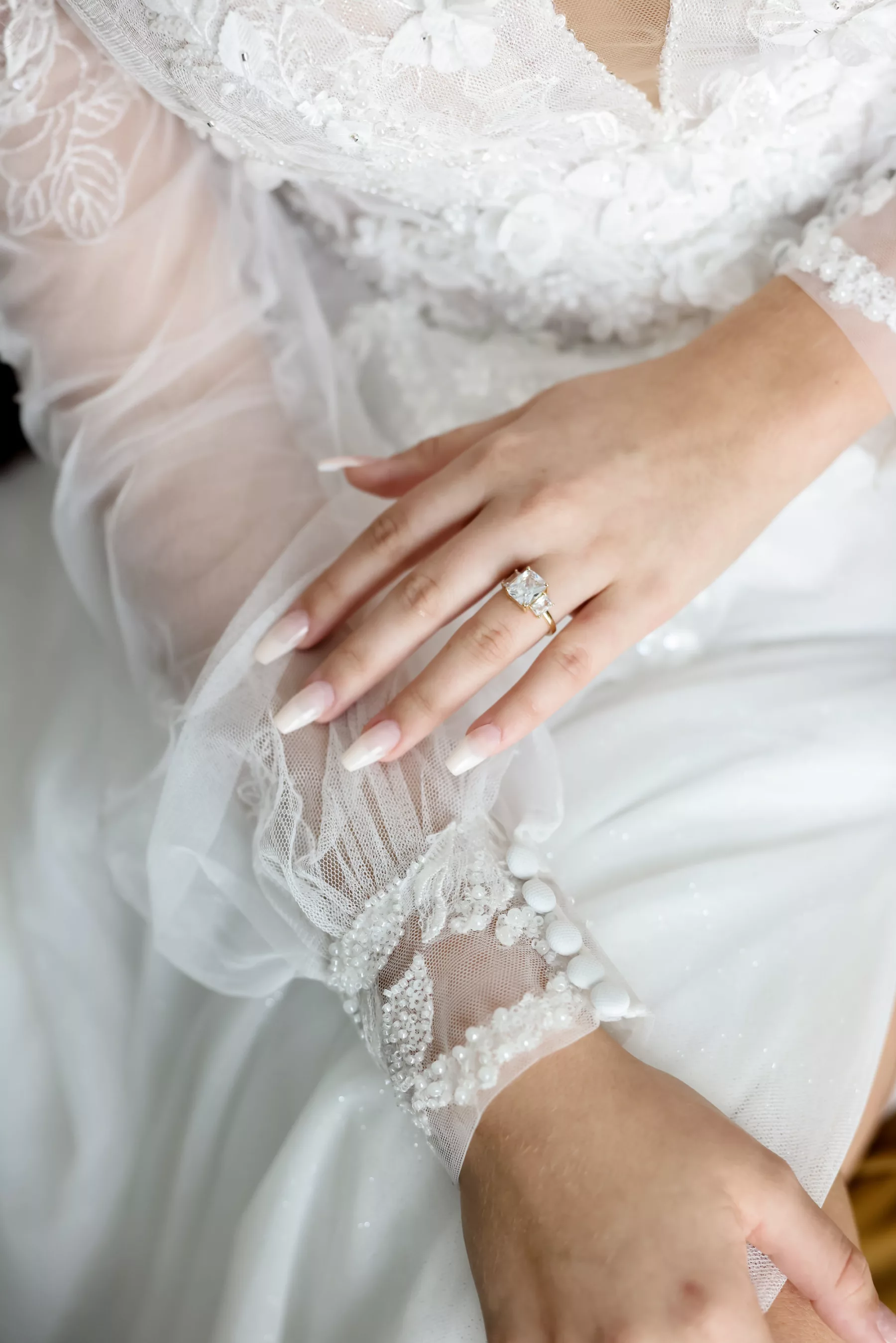 Emerald Diamond Engagement Ring Inspiration | White Lace and Tulle Wedding Dress with Sleeves Ideas | Boutique Truly Forever Bridal Tampa