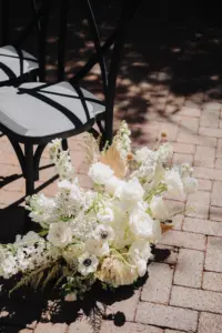 White Roses, Anemone, Hydrangeas, Snapdragons, and Dried Palm Leaves Aisle Arrangement for Modern Great Gatsby Inspired Wedding Ceremony | Tampa Bay Florist Marigold Flower Co