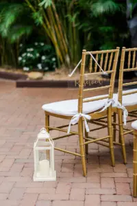 Acrylic Reserved Row Sign for Wedding Ceremony | Gold Chiavari Chairs | White Lantern Aisle Decor Ideas