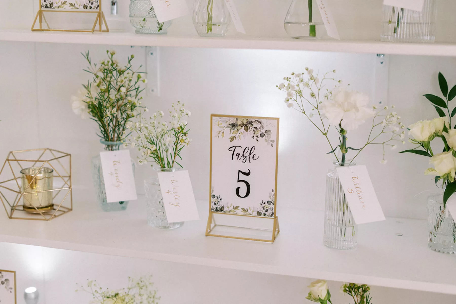 Modern White and Gold Wedding Reception Seating Chart Shelves with Bud Vase Place Cards Inspiration