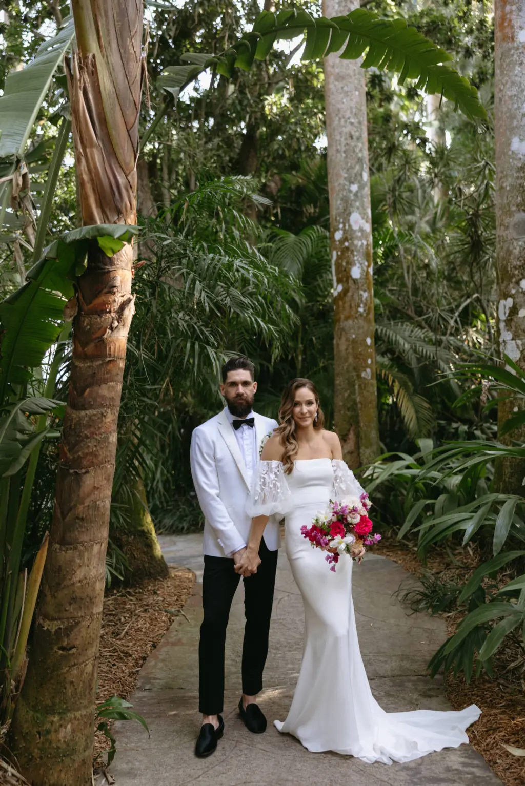 Bride and Groom Garden Wedding Portrait | St. Petersburg Florida Event Venue Sunken Gardens | Black and White Groom Tuxedo Suit with Bowtie | Tampa Bay Wedding Planner Wilder Mind Events
