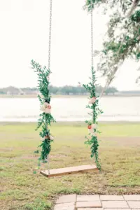 Swing with Greenery and Pink Roses for Wedding Reception Photo Op Ideas