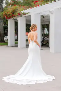 White Lace Deep V Neckline Fit and Flare Open Back Wedding Dress Inspiration | Elegant Bridal Updo Hair and Makeup Ideas | St Pete Photographer Eddy Almaguer Photography